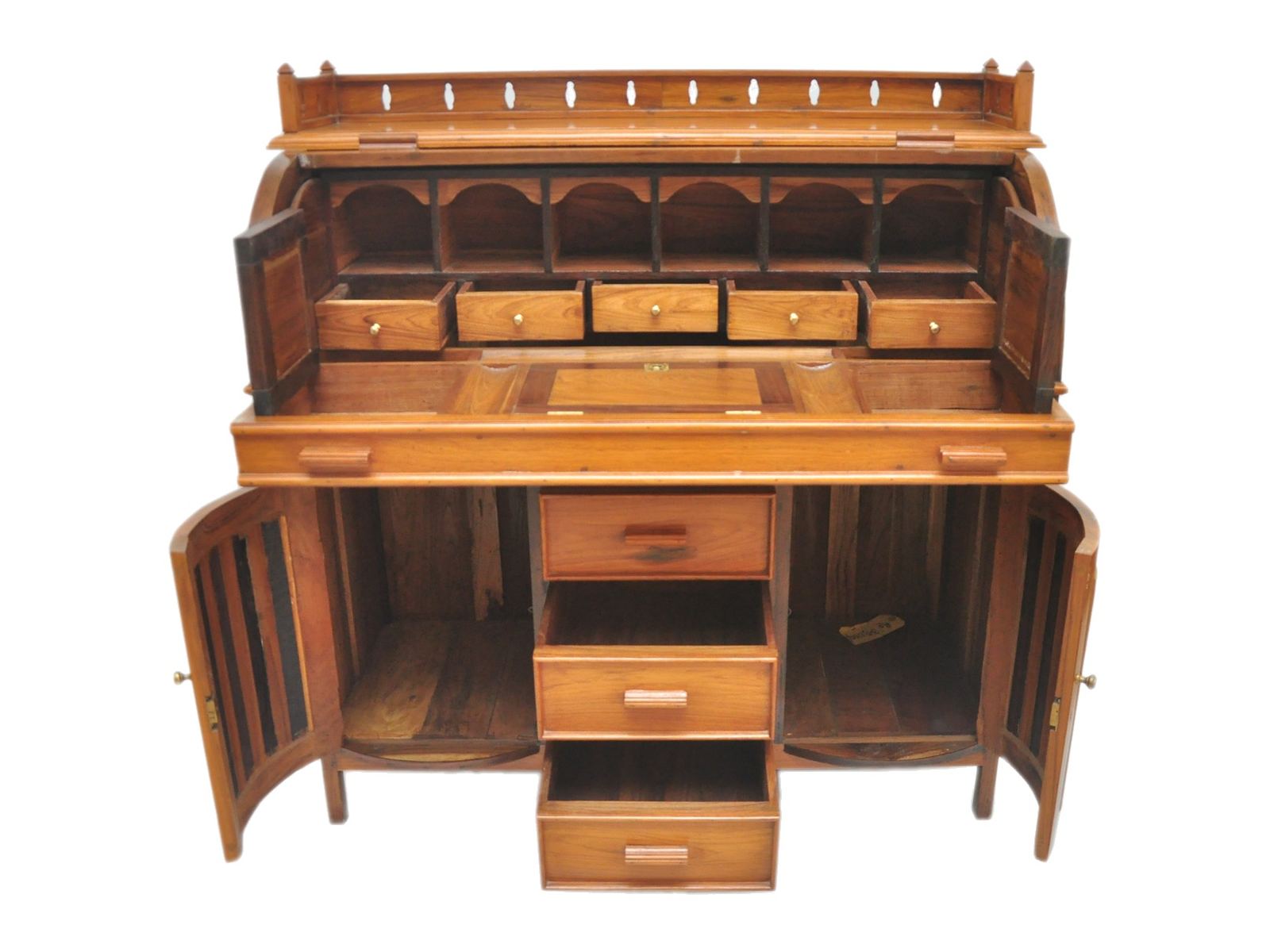 Cylinder desk, open by Carpenters Choice — behind the roll: pigeonholes, five small drawers, and the writing surface