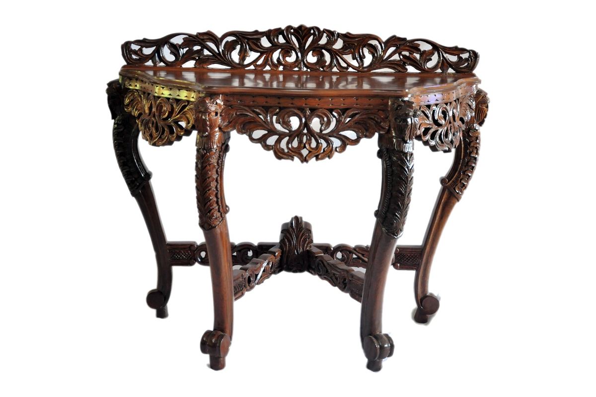 A carved console table by Carpenters Choice — pierced gallery and apron, carved cabriole legs, and a carved cross-stretcher
