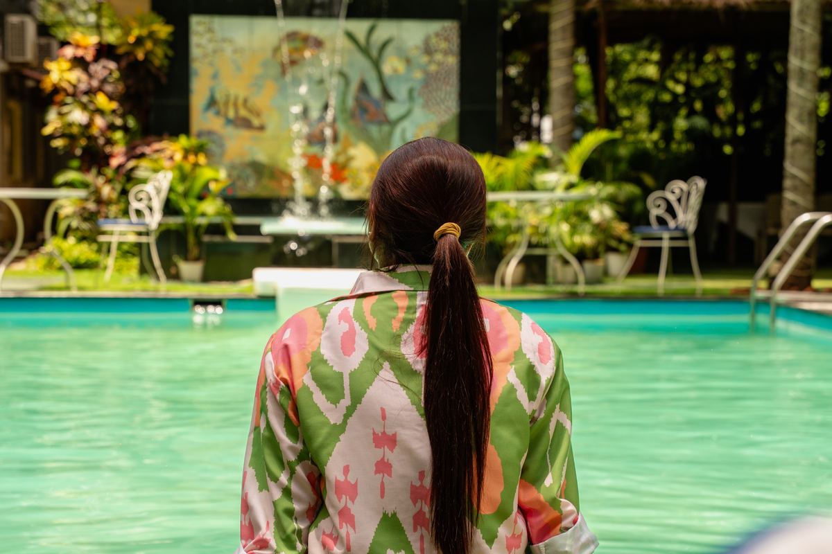 The pool at Magnum Resorts, with its tiled cascade wall